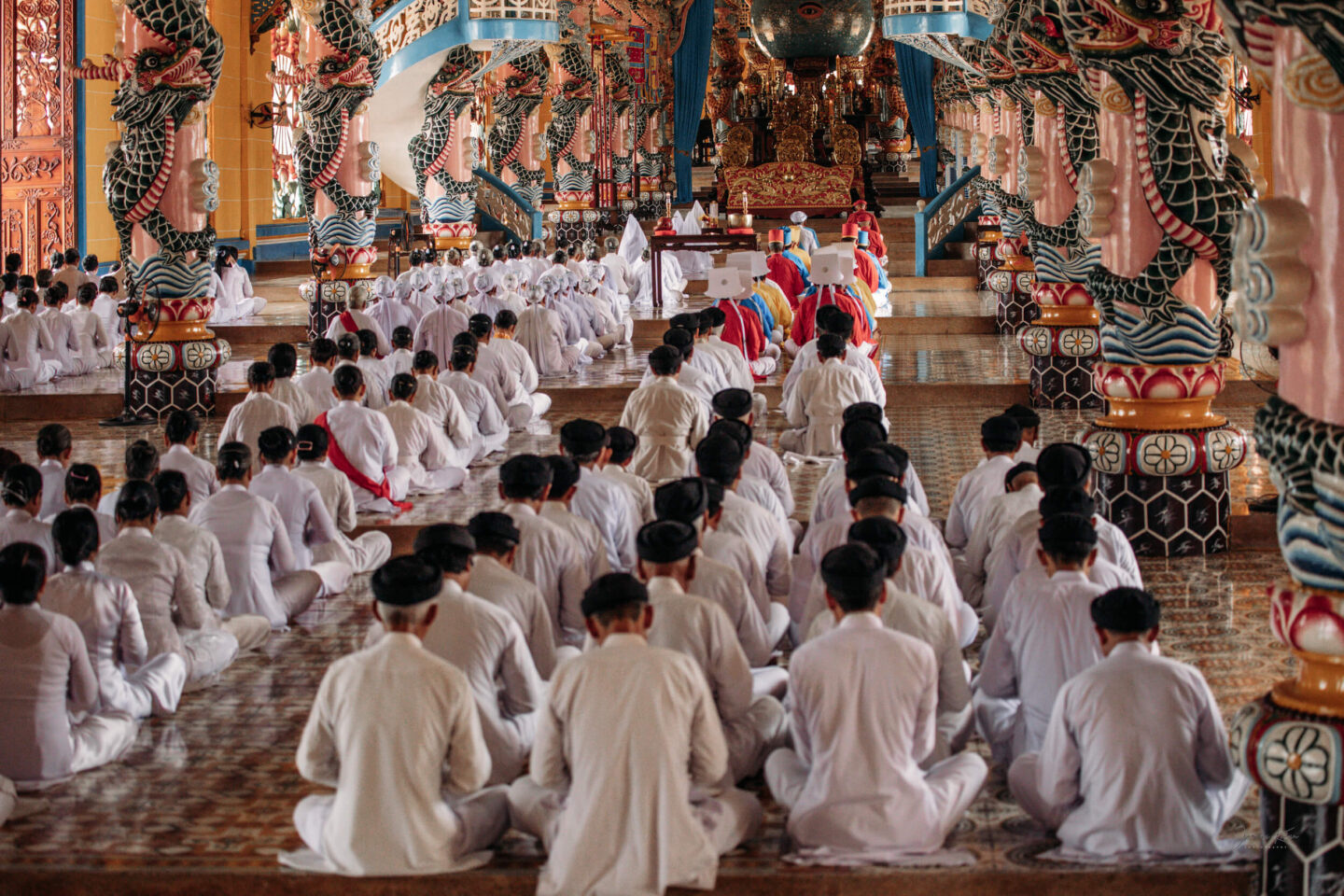 Worshippers attend a Caodaism ceremony in Cao Dai Temple, northwest of Ho Chi Minh City, Southeast Vietnam.