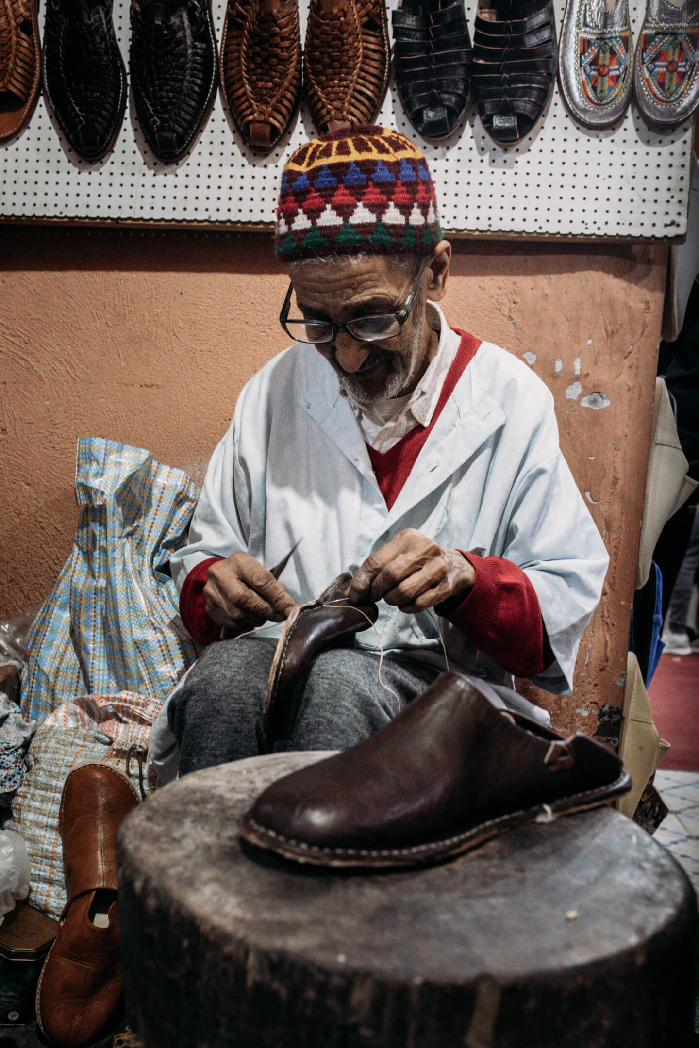 A man repairing shoes in the medina, Marrakech 